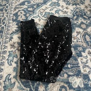 Express black sequin leggings in size XS.